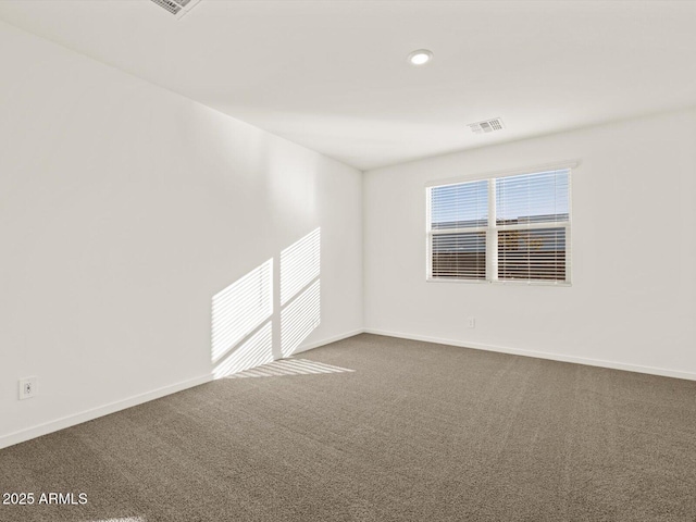 5573 S 246th Ave, Buckeye, AZ 85326 - empty room with dark colored carpet and baseboards