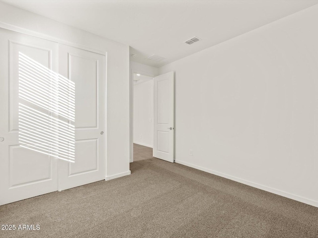 5573 S 246th Ave, Buckeye, AZ 85326 - unfurnished bedroom featuring carpet flooring and a closet
