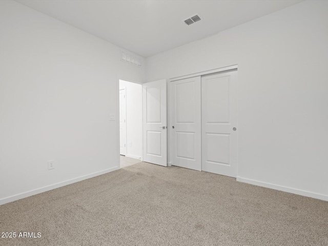 5573 S 246th Ave, Buckeye, AZ 85326 - unfurnished bedroom featuring carpet flooring and a closet
