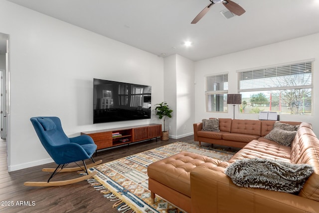 21716 E Waverly Dr, Queen Creek, AZ 85142 - living room featuring dark wood-type flooring and ceiling fan