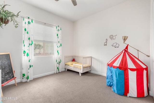 21716 E Waverly Dr, Queen Creek, AZ 85142 - bedroom featuring ceiling fan, carpet flooring, and a crib