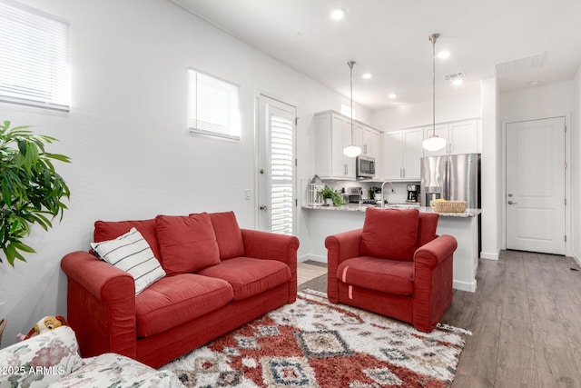 21716 E Waverly Dr, Queen Creek, AZ 85142 - living room featuring light hardwood / wood-style floors