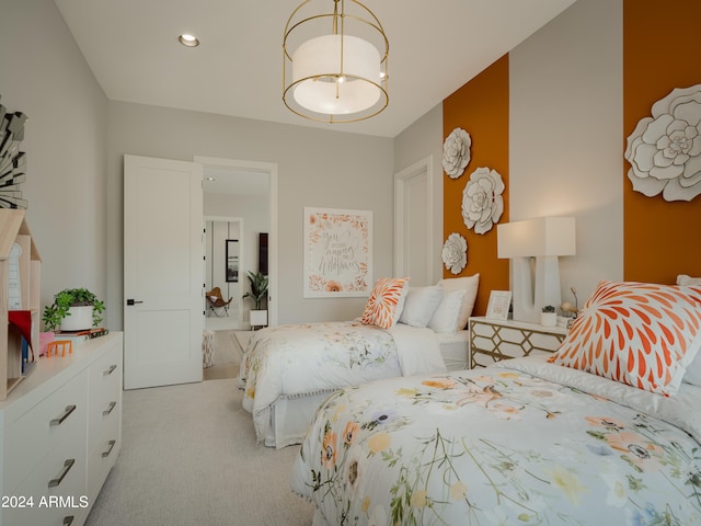 bedroom with light colored carpet