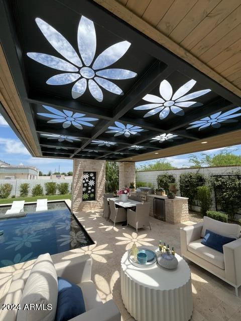 view of patio / terrace with outdoor lounge area, a pool, and ceiling fan