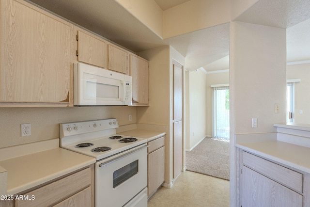 kitchen with crown molding, white appliances, and light brown cabinetry