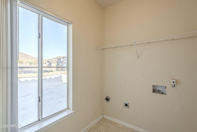 laundry room with washer hookup and hookup for an electric dryer