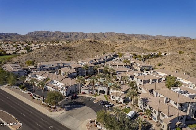 drone / aerial view featuring a mountain view