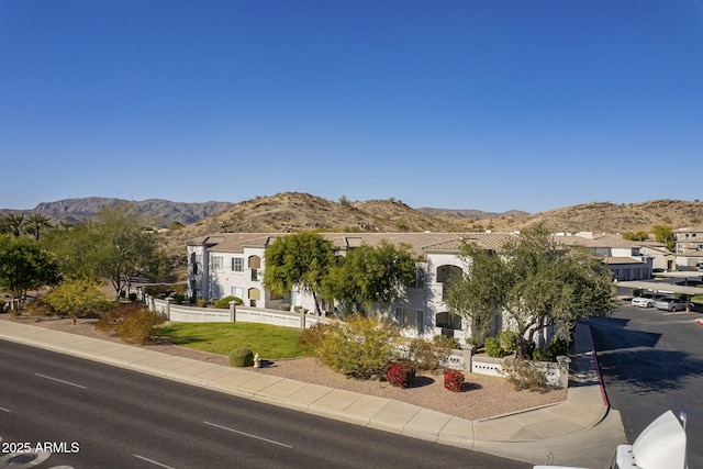 view of front of home featuring a mountain view