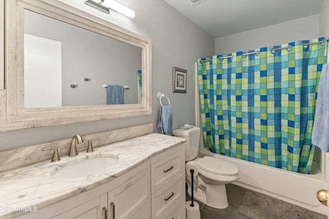 full bathroom with shower / bath combo with shower curtain, vanity, hardwood / wood-style floors, and toilet