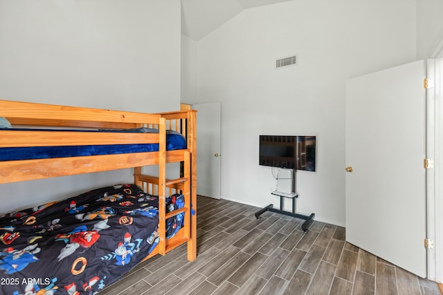 bedroom featuring vaulted ceiling