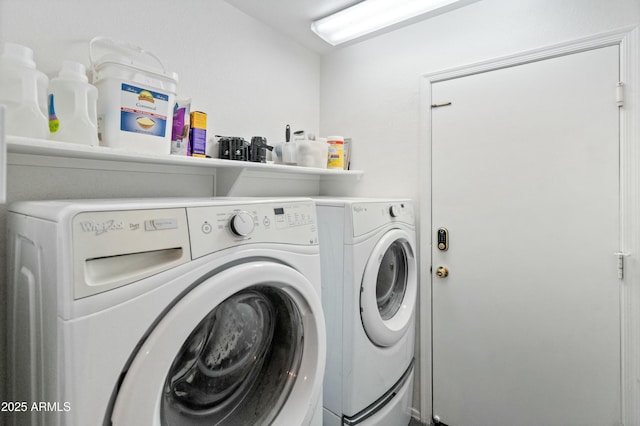 laundry area featuring washing machine and dryer