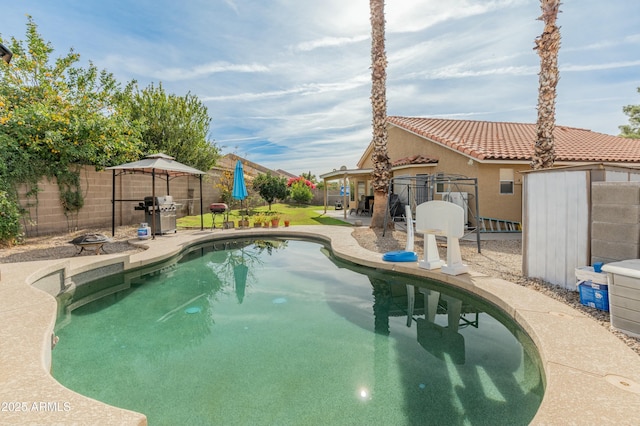 view of pool featuring a gazebo and a patio area