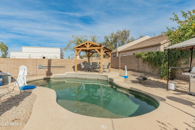 view of swimming pool with a gazebo and a patio