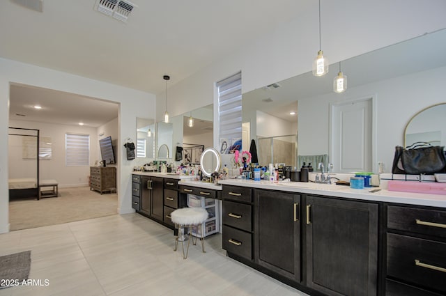 bathroom featuring vanity and tile patterned flooring