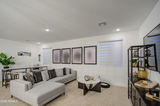 living room with light colored carpet