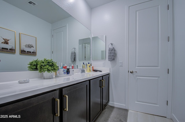 bathroom featuring vanity and tile patterned floors