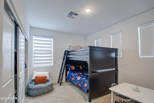 bedroom featuring carpet