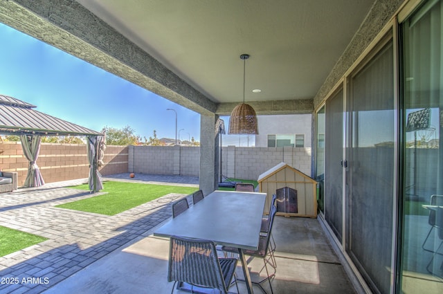 view of patio featuring a gazebo