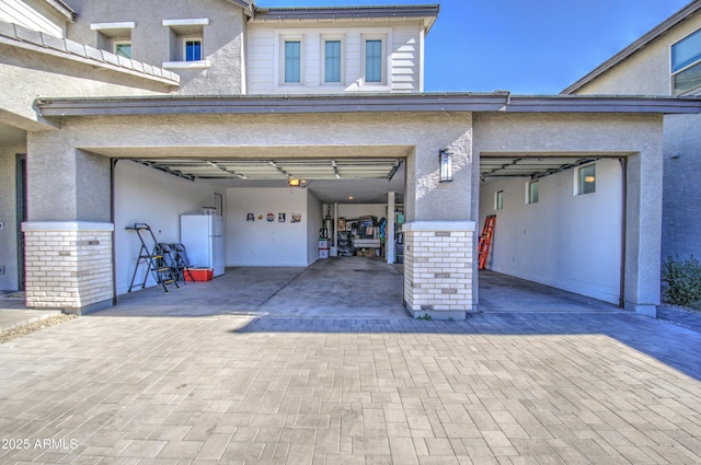 garage with white fridge