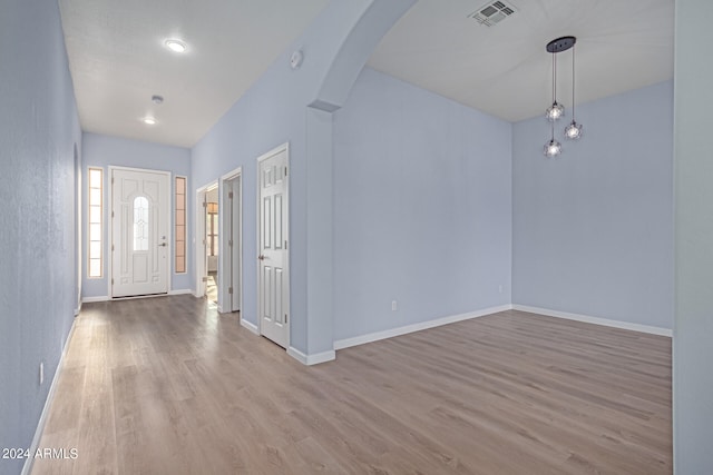 foyer entrance featuring hardwood / wood-style floors