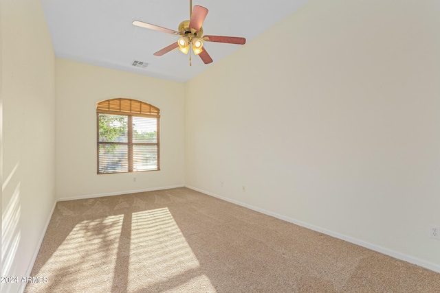 unfurnished room featuring carpet and ceiling fan