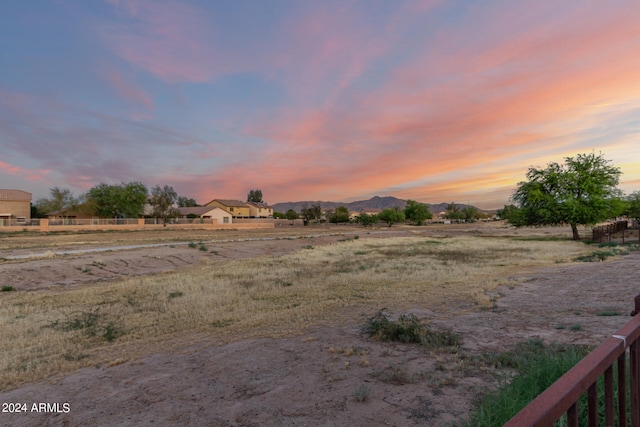 view of yard at dusk