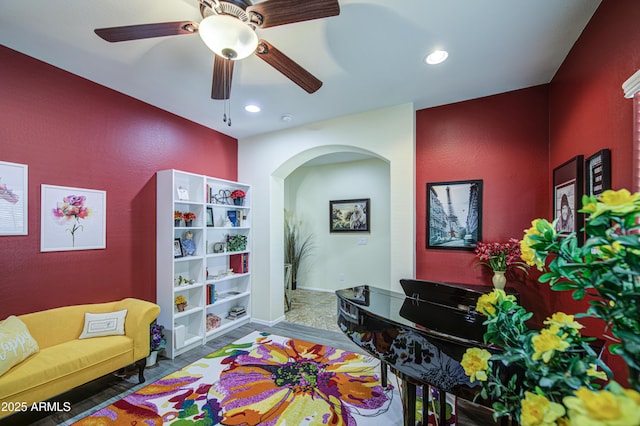6554 W Rushmore Way, Florence, AZ 85132 - rec room featuring arched walkways, a ceiling fan, and recessed lighting