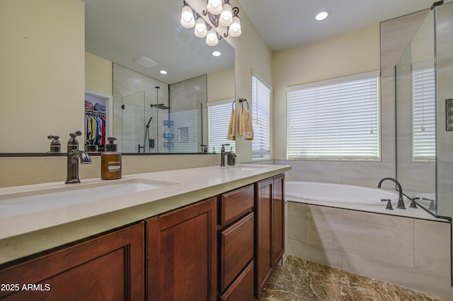 6554 W Rushmore Way, Florence, AZ 85132 - full bathroom with a shower stall, a garden tub, double vanity, a spacious closet, and marble finish floors