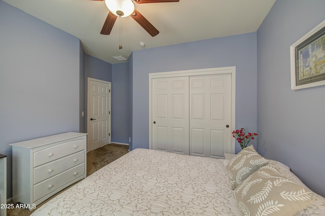 6554 W Rushmore Way, Florence, AZ 85132 - bedroom with carpet, a closet, and ceiling fan