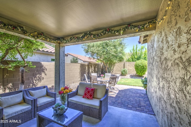 6554 W Rushmore Way, Florence, AZ 85132 - fenced backyard with outdoor dining space, an outdoor hangout area, and a patio area