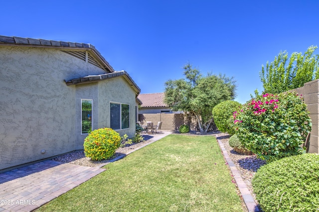 6554 W Rushmore Way, Florence, AZ 85132 - view of yard featuring a patio area