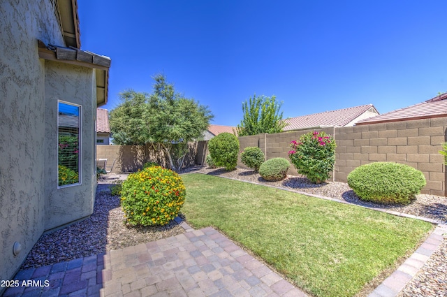 6554 W Rushmore Way, Florence, AZ 85132 - fenced backyard with a patio