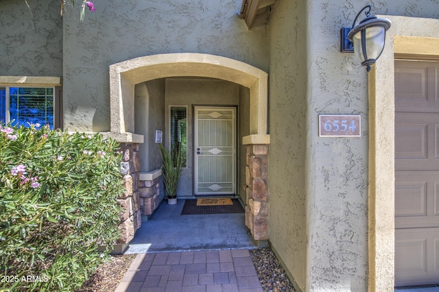 6554 W Rushmore Way, Florence, AZ 85132 - property entrance featuring stucco siding