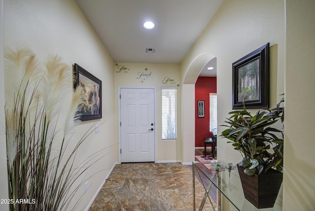 6554 W Rushmore Way, Florence, AZ 85132 - entryway with arched walkways, marble finish floors, and recessed lighting