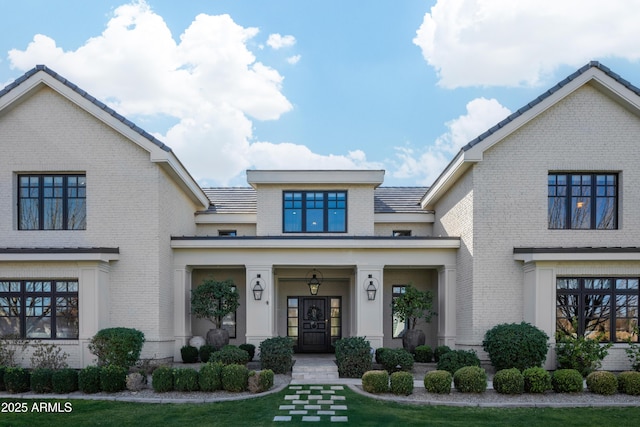 view of front of home with a front yard