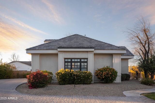 view of property exterior at dusk