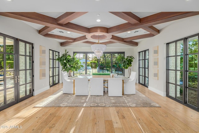 reception area with french doors and a chandelier