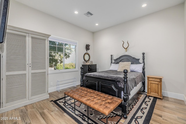 bedroom with light wood-type flooring