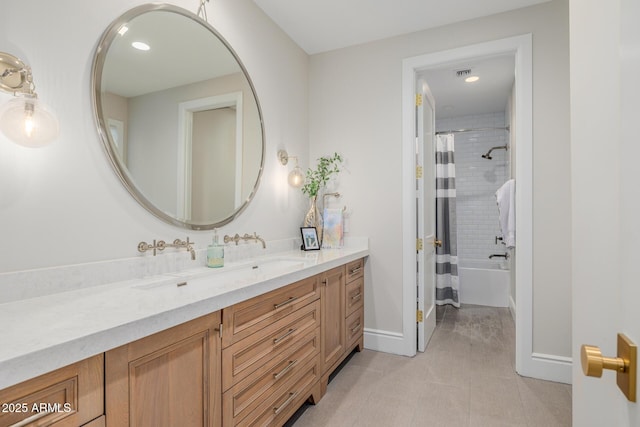 bathroom with vanity, shower / bath combination with curtain, and tile patterned floors