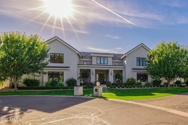 view of front of house featuring a front lawn