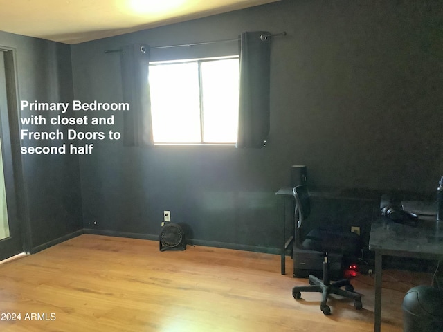 7857 W Winchester Easement, Willcox, AZ 85643 - unfurnished office featuring wood finished floors and baseboards