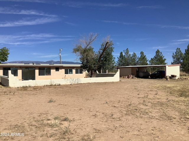 7857 W Winchester Easement, Willcox, AZ 85643 - back of house with a carport