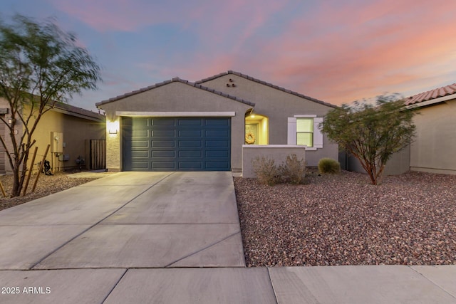 view of front of property with a garage