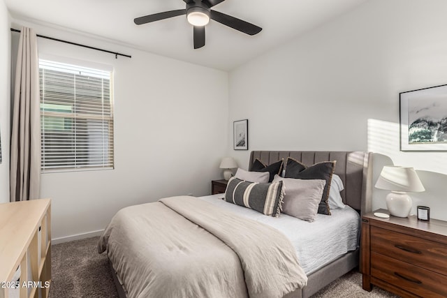 bedroom with ceiling fan and carpet floors