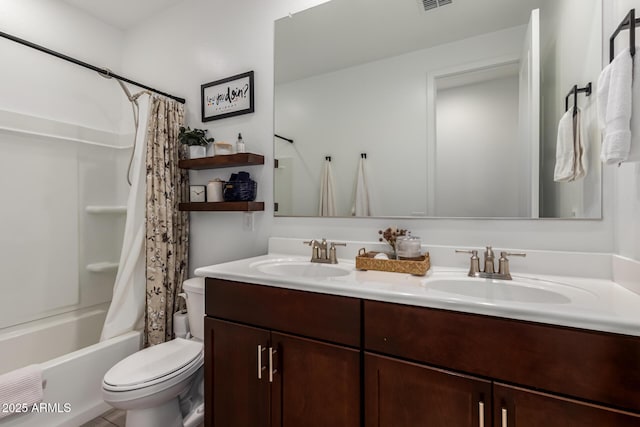 full bathroom featuring vanity, toilet, and shower / tub combo with curtain