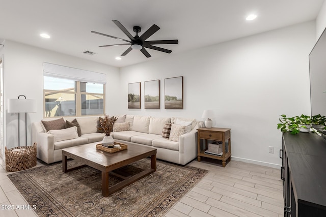 living room featuring ceiling fan