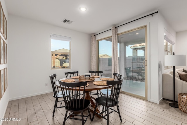 dining space featuring plenty of natural light