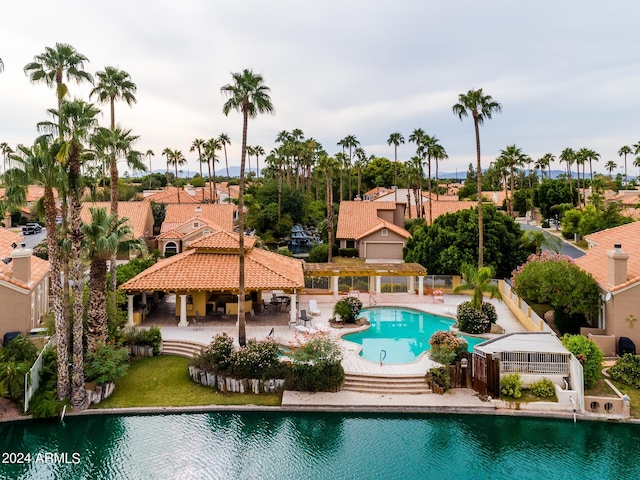 view of pool with an outdoor structure, a patio, and a gazebo