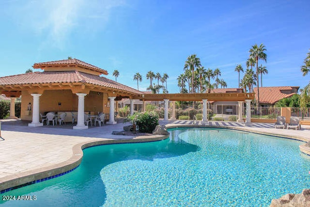 view of pool featuring a patio area