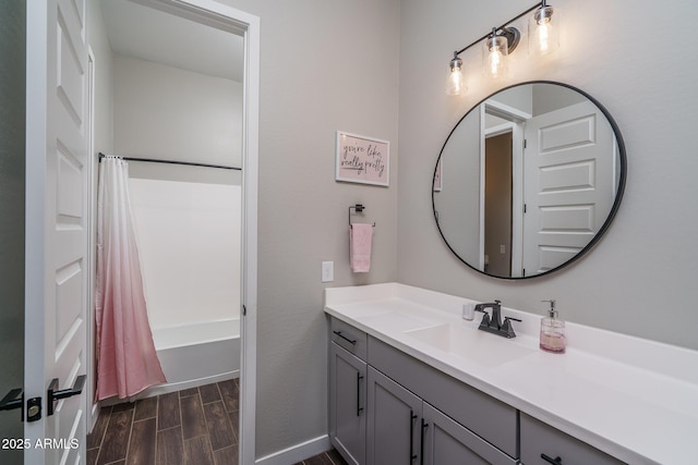 12702 W Sierra Vista Dr, Glendale, AZ 85307 - bathroom featuring shower / bath combo, vanity, and wood tiled floor